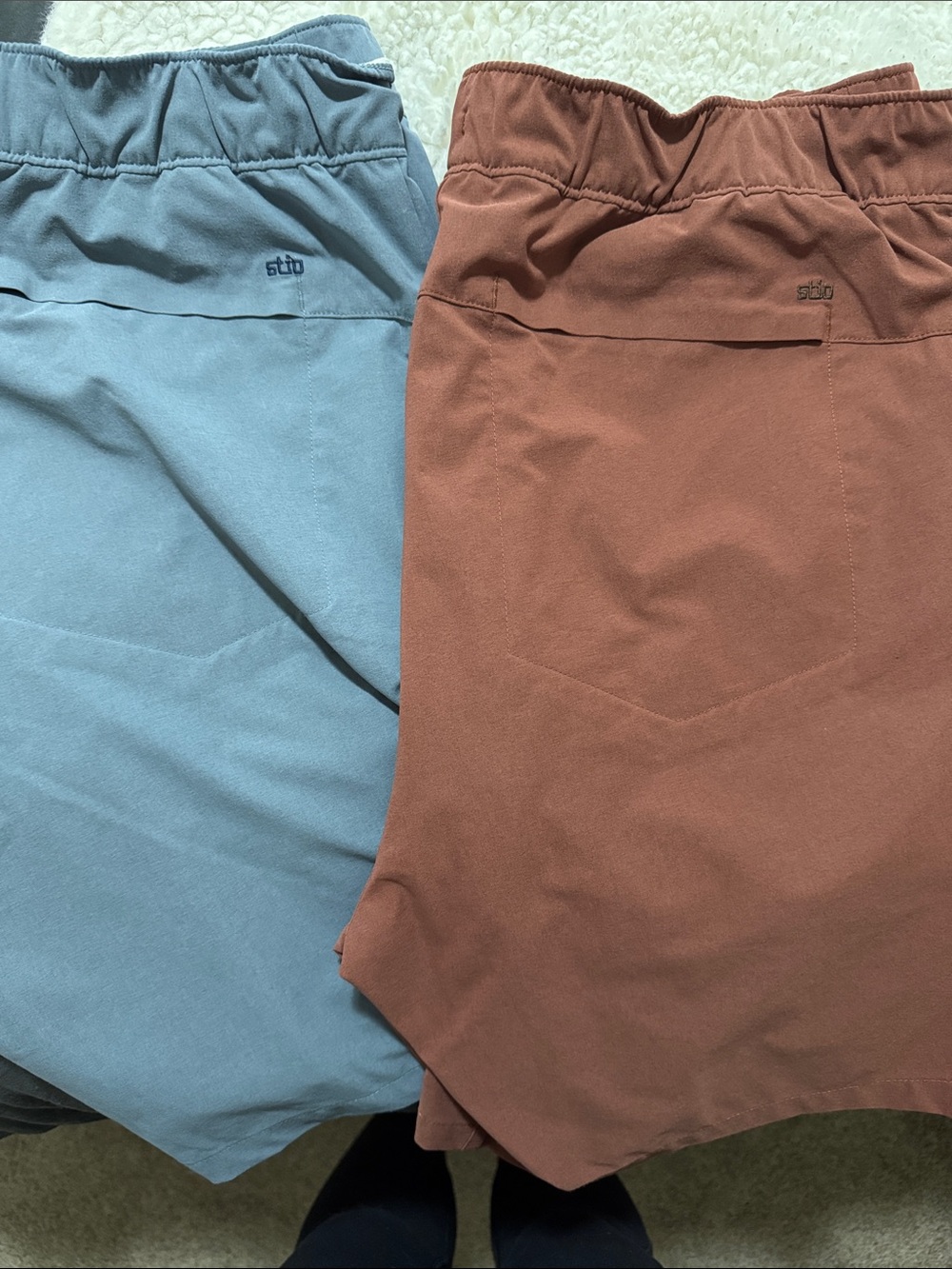 Stio Men's Shorts in Blue and Rust